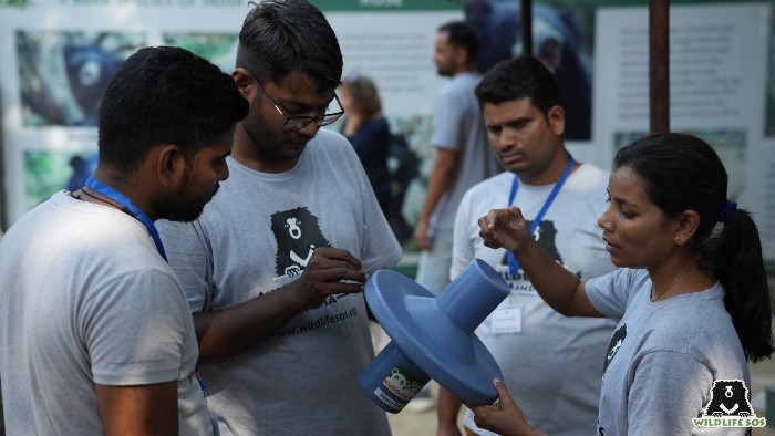 Our bear caregivers examine enrichment devices during the training workshop