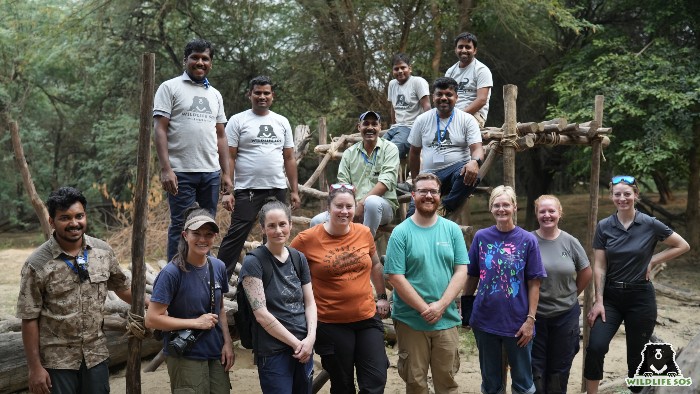 bear care staff instructed the TAG team keepers knotting techniques used for making enrichment platforms 