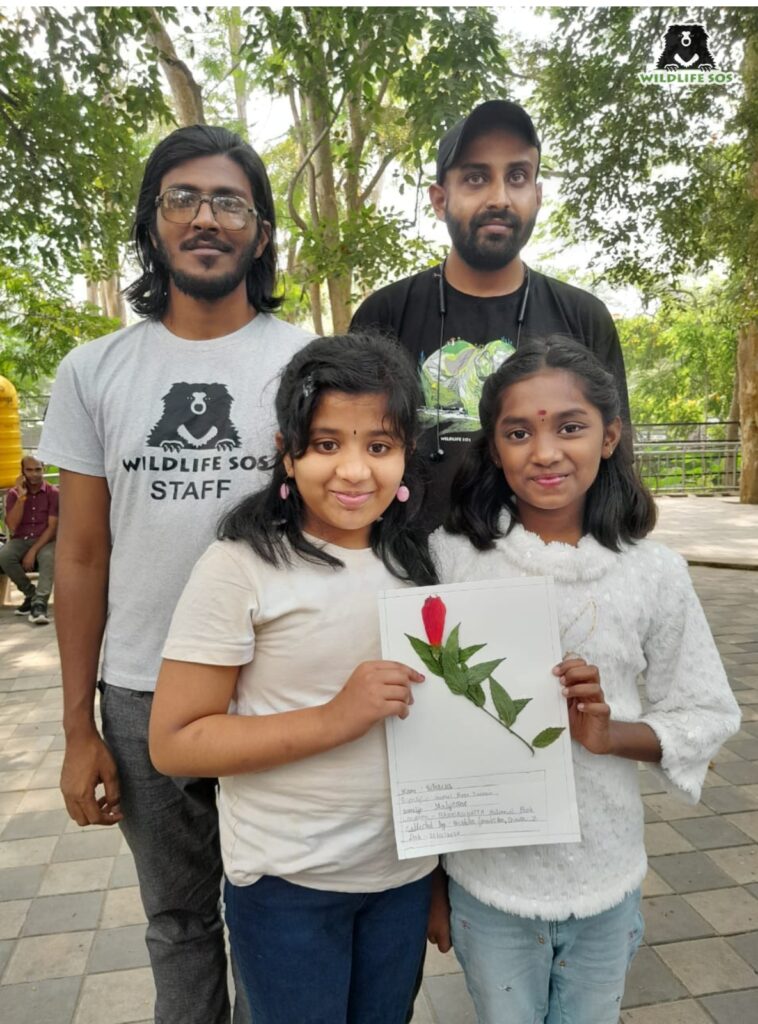 Children enthusiastically engaged in the herbarium workshop